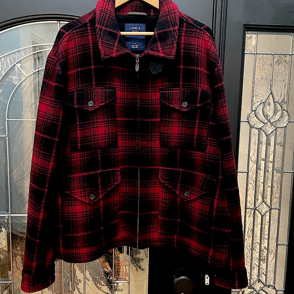 Great, black and red plaid jacket. Perfect for the holidays.